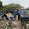 Hütten in einem Slum in Indien